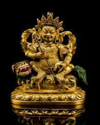 Fine fire-gilded Bronze Vaishravana on lion with a rod of silver Fine fire-gilded Bronze Vaishravana on lion with a rod of silver
