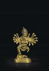 AN IMPORTANT GILT-BRONZE FIGURE OF KAPALADHARA HEVAJRA AN IMPORTANT GILT-BRONZE FIGURE OF KAPALADHARA HEVAJRA
