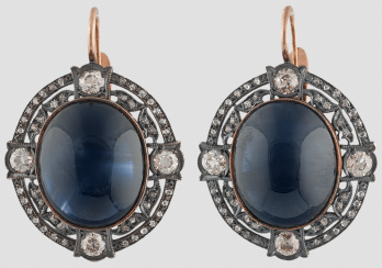 Earrings with large sapphires. Earrings with large sapphires.
