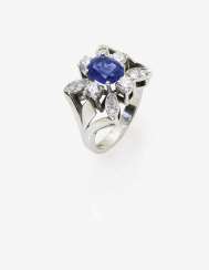 Ring with tanzanite and diamonds Ring with tanzanite and diamonds