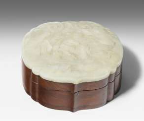 Jade plaque on lid of box Jade plaque on lid of box