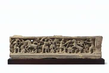 A GRAY SCHIST RELIEF WITH SCENES OF THE HUNT A GRAY SCHIST RELIEF WITH SCENES OF THE HUNT