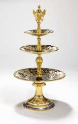The Imperial Porcelain Factory: “The Kremlin Service” - a large Russian porcelain tazza in three levels. Marked Nicholas I of Russia (1825–1855). H. 48 cm. The Imperial Porcelain Factory: “The Kremlin Service” - a large Russian porcelain tazza in three levels. Marked Nicholas I of Russia (1825–1855). H. 48 cm.