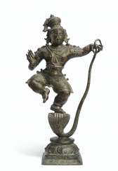 A LARGE BRONZE FIGURE OF KRISHNA KALIYADAMAN A LARGE BRONZE FIGURE OF KRISHNA KALIYADAMAN