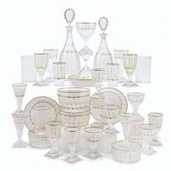 AN ASSEMBLED KOSTA CLEAR AND GREEN ETCHED AND CUT-GLASS PART STEMWARE SERVICE AN ASSEMBLED KOSTA CLEAR AND GREEN ETCHED AND CUT-GLASS PART STEMWARE SERVICE