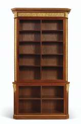 A PAIR OF FRENCH MAHOGANY AND PARCEL-GILT BOOKCASES A PAIR OF FRENCH MAHOGANY AND PARCEL-GILT BOOKCASES