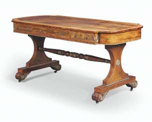 A REGENCY BRASS-MOUNTED BRAZILIAN ROSEWOOD AND SATINWOOD-CROSSBANDED WRITING-TABLE A REGENCY BRASS-MOUNTED BRAZILIAN ROSEWOOD AND SATINWOOD-CROSSBANDED WRITING-TABLE
