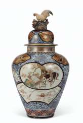 A JAPANESE IMARI VASE AND COVER A JAPANESE IMARI VASE AND COVER