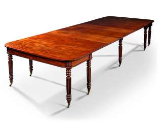 A SCOTTISH REGENCY MAHOGANY EXTENDING DINING-TABLE A SCOTTISH REGENCY MAHOGANY EXTENDING DINING-TABLE