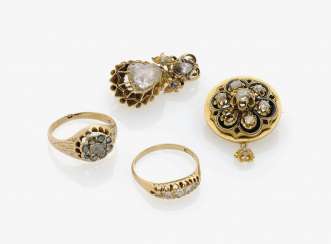 TWO BROOCHES AND TWO RINGS WITH old European cut diamonds, Austria and . Germany, around 1880 TWO BROOCHES AND TWO RINGS WITH old European cut diamonds, Austria and . Germany, around 1880