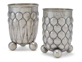 TWO SIMILAR GERMAN SILVER BEAKERS TWO SIMILAR GERMAN SILVER BEAKERS