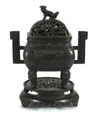 Incense burner, Bronze with side handle and bat decor Incense burner, Bronze with side handle and bat decor