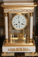 Table clock in Empire style, France of the XIX century. Table clock in Empire style, France of the XIX century.
