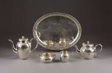 FOUR-PIECE TEA AND COFFEE SERVICE ON TRAY FOUR-PIECE TEA AND COFFEE SERVICE ON TRAY