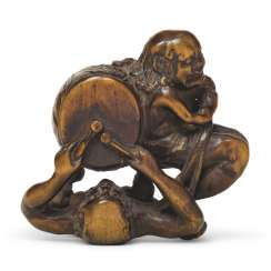 A WOOD NETSUKE OF ASHINAGA AND TENAGA A WOOD NETSUKE OF ASHINAGA AND TENAGA