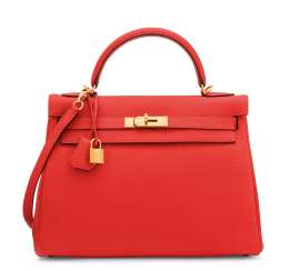 A CAPUCINE TOGO LEATHER RETOURNÉ KELLY 32 WITH GOLD HARDWARE... A CAPUCINE TOGO LEATHER RETOURNÉ KELLY 32 WITH GOLD HARDWARE...