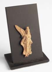 Small Greek Nike figure produced as Small Greek Nike figure produced as