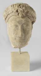 Stucco head of a Kuan Yin Stucco head of a Kuan Yin