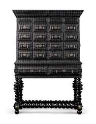A PORTUGUESE EBONISED RIPPLE-MOULDED CABINET-ON-STAND A PORTUGUESE EBONISED RIPPLE-MOULDED CABINET-ON-STAND