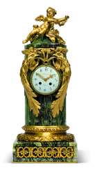 A FRENCH ORMOLU-MOUNTED GREEN-MARBLE MANTEL CLOCK A FRENCH ORMOLU-MOUNTED GREEN-MARBLE MANTEL CLOCK
