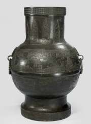 Big 'hu'shaped Vase made of Bronze handles in archaic style with mask and loose Ring Big 'hu'shaped Vase made of Bronze handles in archaic style with mask and loose Ring