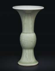 A SMALL INCISED CELADON-GLAZED GU-FORM VASE A SMALL INCISED CELADON-GLAZED GU-FORM VASE