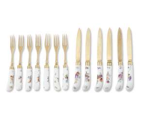 AN OZIER-MOLDED SILVER-GILT MOUNTED GERMAN PORCELAIN PART FLATWARE SERVICE AN OZIER-MOLDED SILVER-GILT MOUNTED GERMAN PORCELAIN PART FLATWARE SERVICE