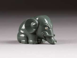 FIGURE OF A SEATED ELEPHANT FIGURE OF A SEATED ELEPHANT