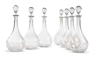 SEVEN BACCARAT GLASS DECANTERS AND STOPPERS SEVEN BACCARAT GLASS DECANTERS AND STOPPERS
