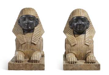 A PAIR OF VEINED YELLOW AND GREY MARBLE SPHINXES A PAIR OF VEINED YELLOW AND GREY MARBLE SPHINXES