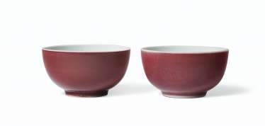 A PAIR OF SMALL COPPER-RED-GLAZED WINE CUPS A PAIR OF SMALL COPPER-RED-GLAZED WINE CUPS