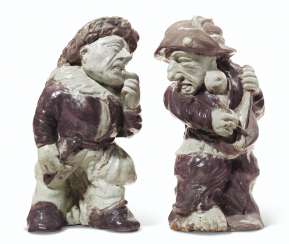 A PAIR OF CONTINENTAL TIN-GLAZED TERRACOTTA FIGURES OR ARCHI... A PAIR OF CONTINENTAL TIN-GLAZED TERRACOTTA FIGURES OR ARCHI...