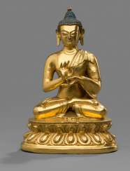 Fire-gilt Bronze of the Buddha Shakyamuni on a Lotus pedestal Fire-gilt Bronze of the Buddha Shakyamuni on a Lotus pedestal