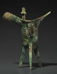 A RARE BRONZE RITUAL TRIPOD WINE VESSEL, JUE A RARE BRONZE RITUAL TRIPOD WINE VESSEL, JUE