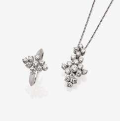 Set: pendant with chain, Ring and a Pair of stud earrings with brilliant Set: pendant with chain, Ring and a Pair of stud earrings with brilliant