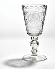 St. Petersburg Glassworks: A Russian clear glass goblet with portrait of Tsaritsa Elizabeth I Petrovna and the Russian double-headed eagle. 1750–1760. H. 27 cm. St. Petersburg Glassworks: A Russian clear glass goblet with portrait of Tsaritsa Elizabeth I Petrovna and the Russian double-headed eagle. 1750–1760. H. 27 cm.