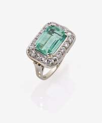 Ring with emerald and diamonds Ring with emerald and diamonds