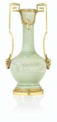 A NEOCLASSICAL ORMOLU-MOUNTED CHINESE CELADON CRACKLE-GLAZE PORCELAIN VASE A NEOCLASSICAL ORMOLU-MOUNTED CHINESE CELADON CRACKLE-GLAZE PORCELAIN VASE