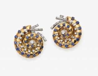 A Pair of ear clips with sapphires and diamonds A Pair of ear clips with sapphires and diamonds