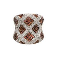Lady's ring with orange-brown sapphires and brilliant-cut diamonds Lady's ring with orange-brown sapphires and brilliant-cut diamonds