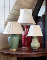 A GROUP OF THREE CHINESE PORCELAIN VASES, MOUNTED AS LAMPS A GROUP OF THREE CHINESE PORCELAIN VASES, MOUNTED AS LAMPS