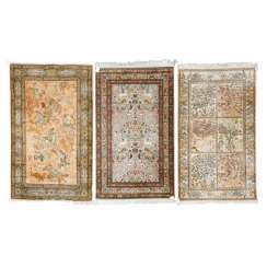 Three Oriental rugs made of silk. Three Oriental rugs made of silk.