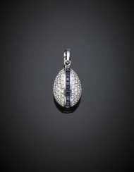 FABERGE' | Diamond and guilloché blue enamel white gold egg pendant FABERGE' | Diamond and guilloché blue enamel white gold egg pendant