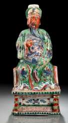 A VERY RARE WUCAI FIGURE OF GUANDI ON A THRONE WITH WOOD A VERY RARE WUCAI FIGURE OF GUANDI ON A THRONE WITH WOOD