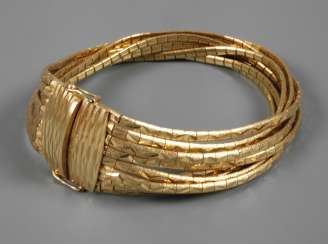 A Multi-Row Gold Bracelet A Multi-Row Gold Bracelet