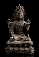 Bronze of a Guanyin on a Lotus base seated Bronze of a Guanyin on a Lotus base seated
