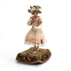 French doll machine with music box French doll machine with music box