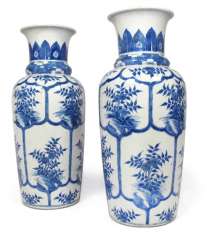 Pair of underglaze blue vases, with floral decoration in cartouches Pair of underglaze blue vases, with floral decoration in cartouches