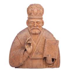A carved figure of St. Nicholas A carved figure of St. Nicholas