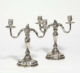 Pair of two-armed silver candlesticks style Rococo Pair of two-armed silver candlesticks style Rococo